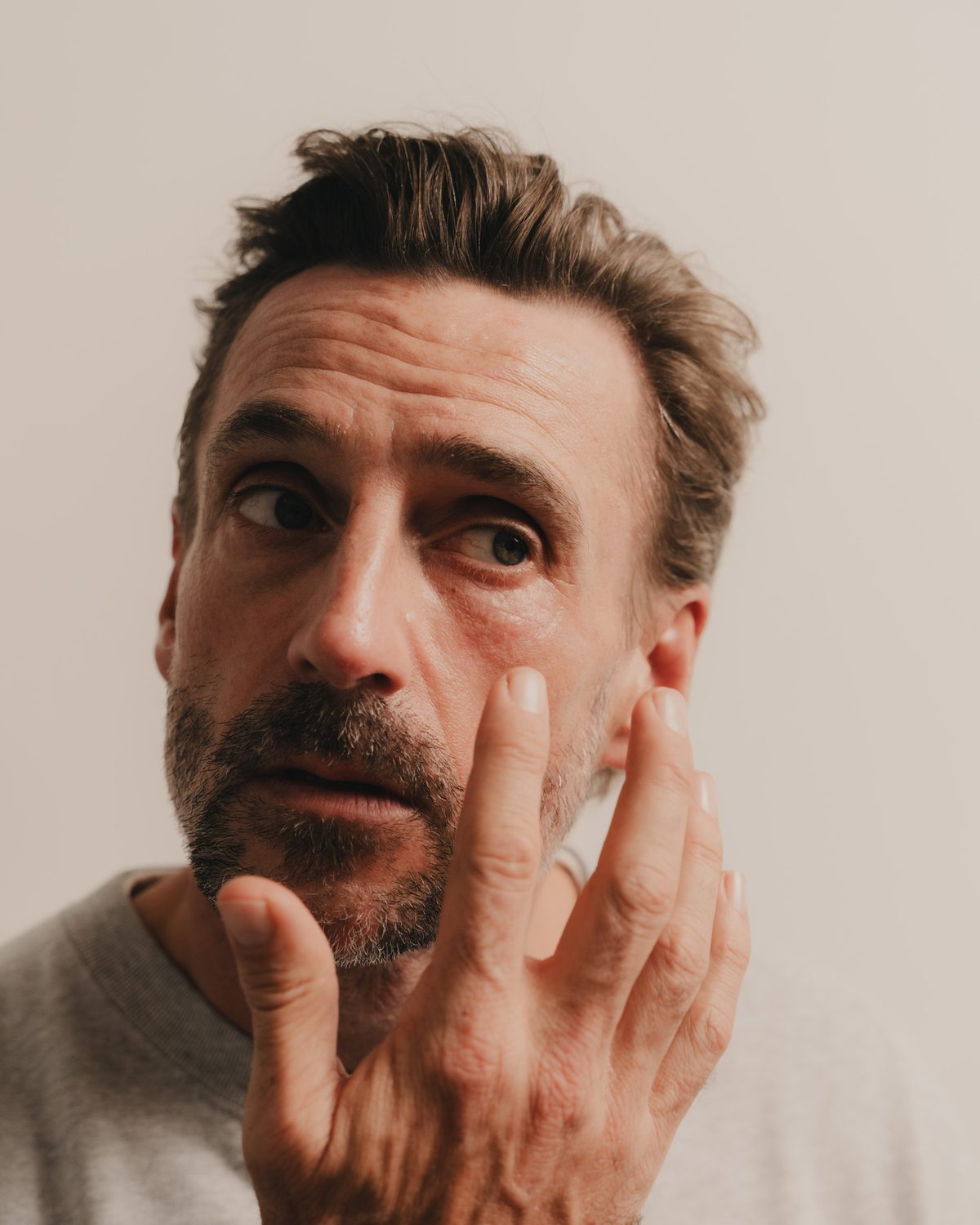 A man's face in natural window light after four weeks of daily use