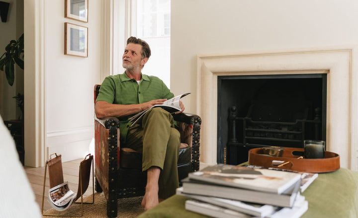 A man reading at home