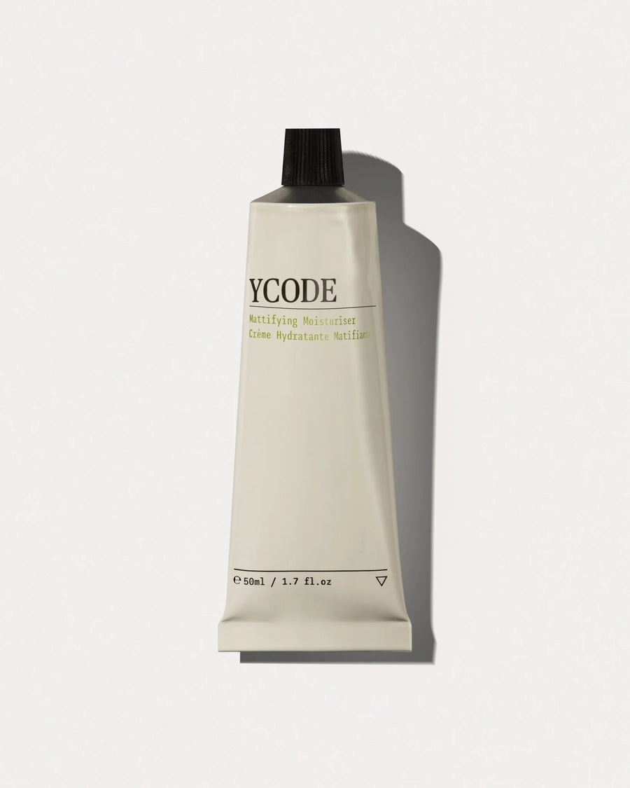 YCODE Mattifying Moisturiser for men, 50ml tube front view on a beige background