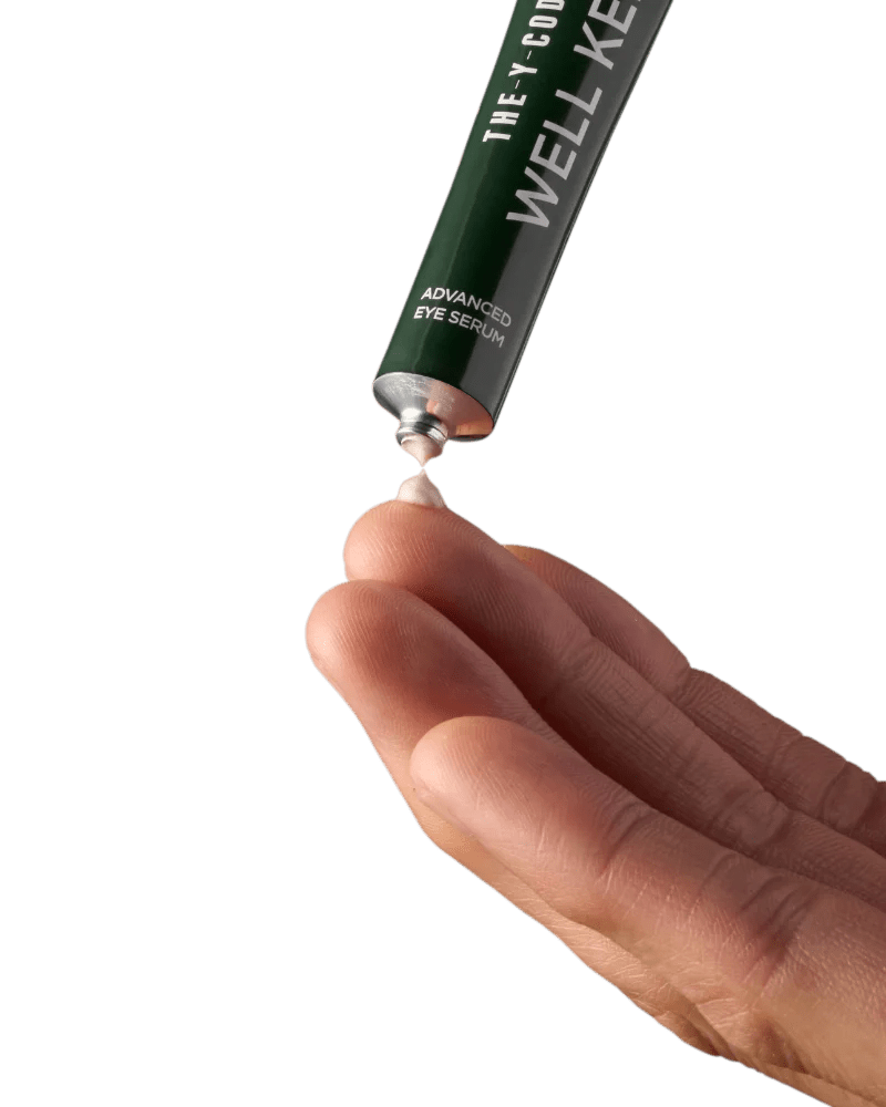 Applying Advanced Eye Serum to fingertip