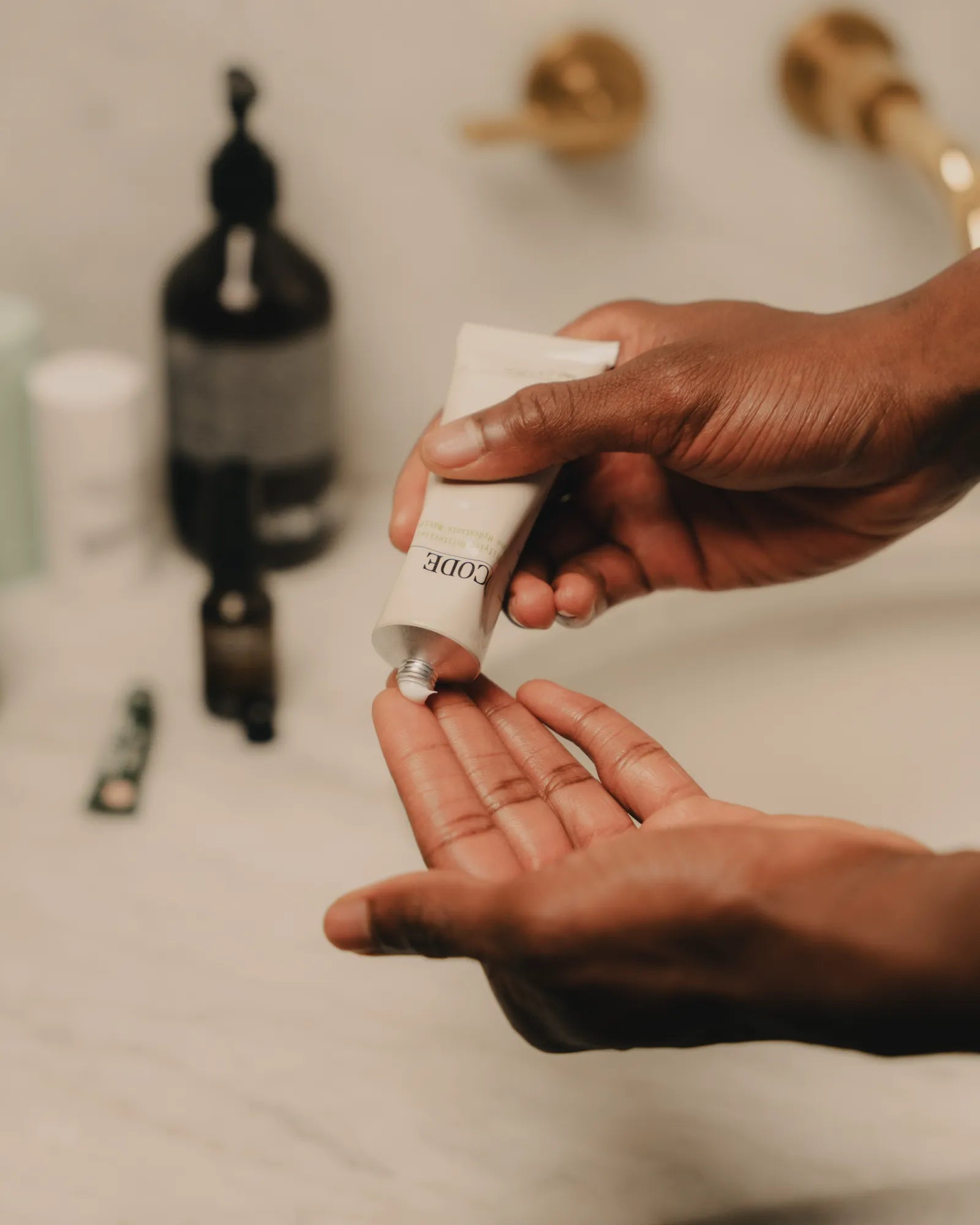 Mattifying Moisturiser dispensed into the hand