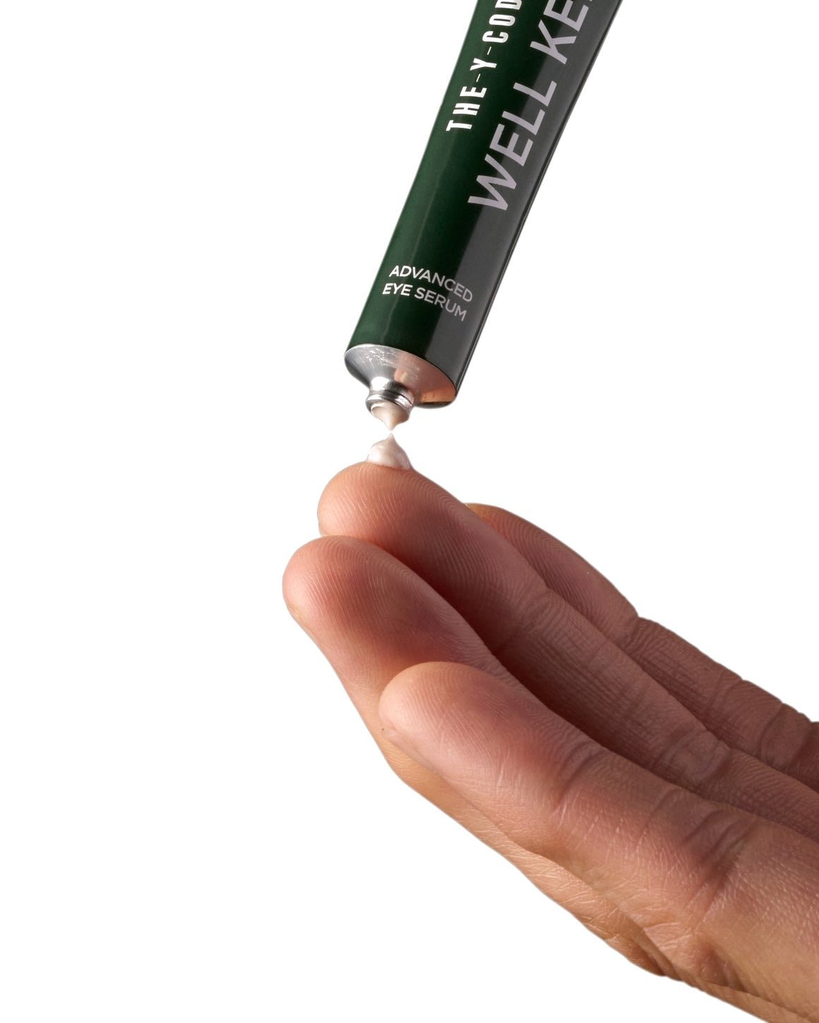 Applying Advanced Eye Serum, a rice grain for both eyes